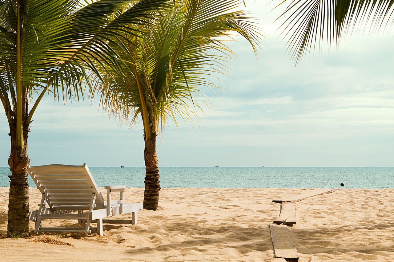Stranden vid Vings hotell Chez Carole Resort
